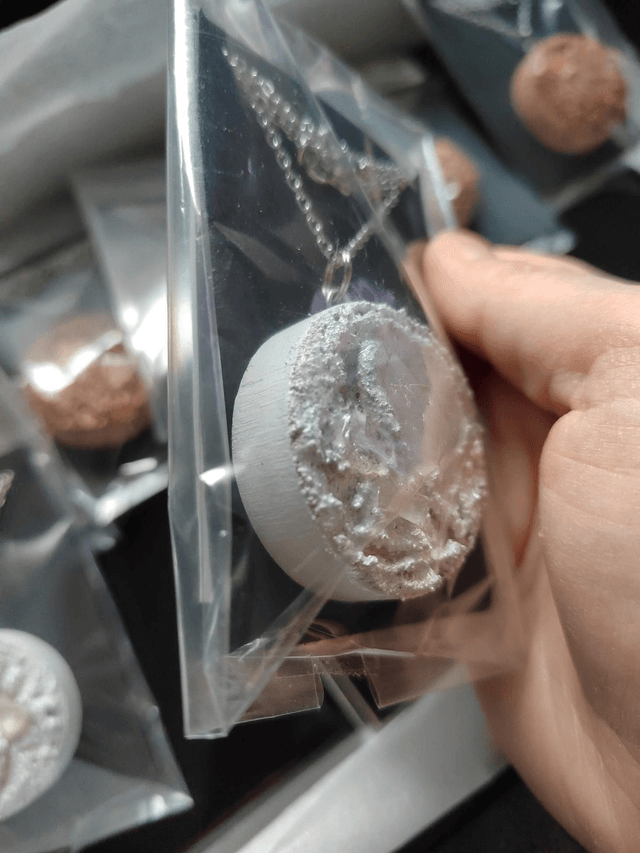 Echoes of the wild 7 - White and beige textured pendant with chain